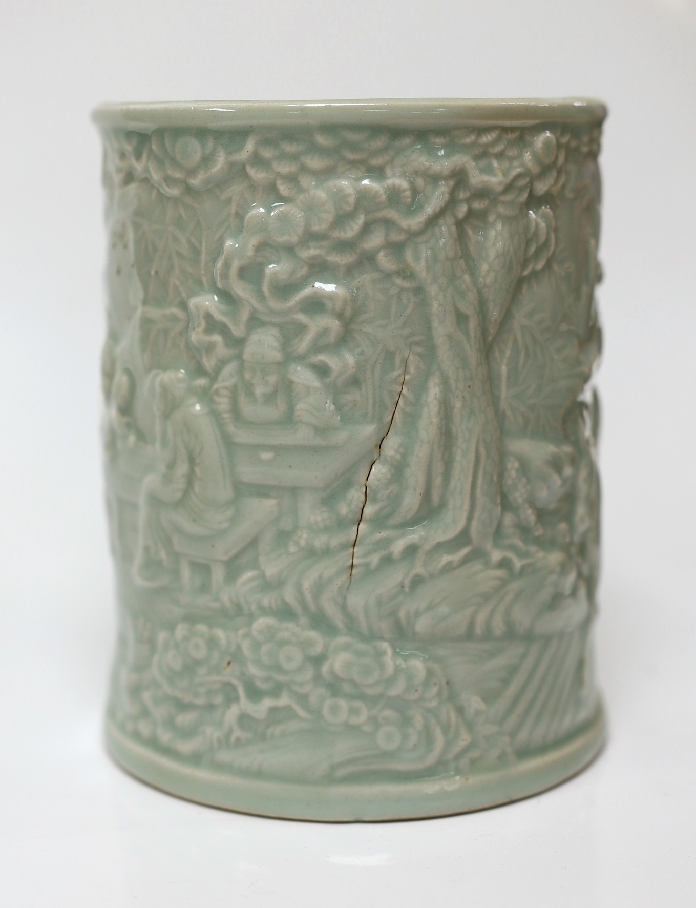 A Chinese celadon glazed brush pot, 15cm